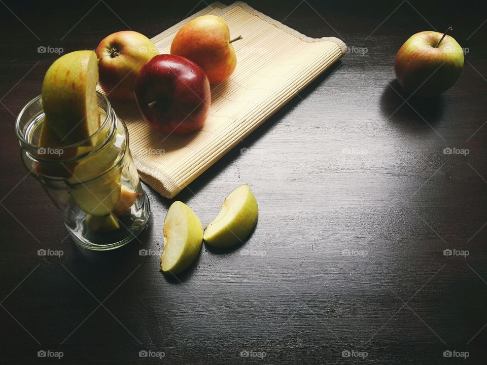 Slice of apples in glass jar