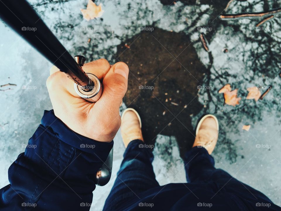 Personal perspective with an umbrella during a rainfall period 