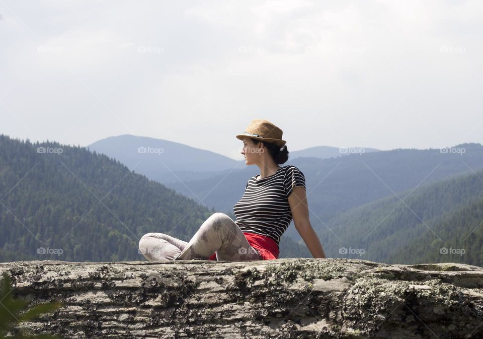 Zen mood in the mountain, sitting on rock