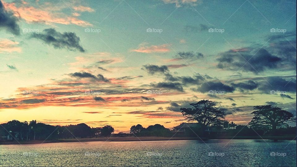 lake, trees and clouds at sunset