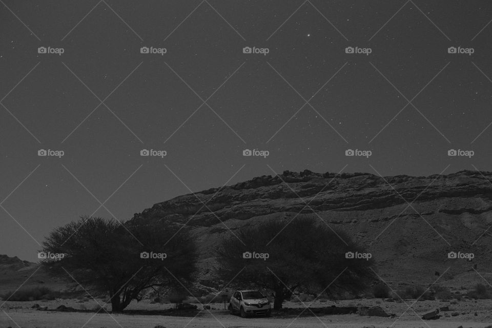 desert in the night in black and white
