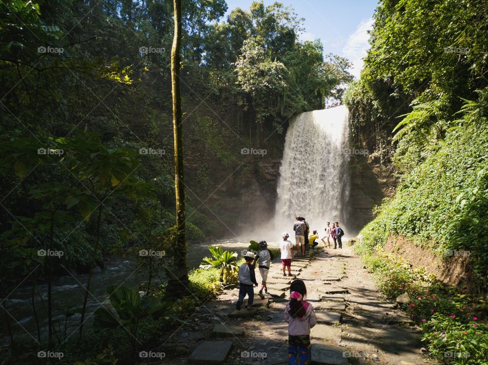 Waterfall and tourists