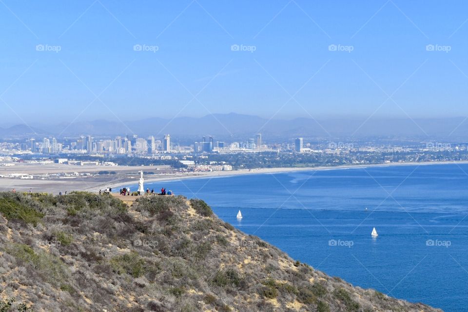 View of the city, Carbrillo National Monument and the ocean at Point Loma in San Diego, CA