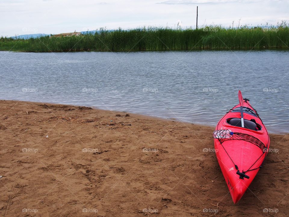 Canoe on lakeshore