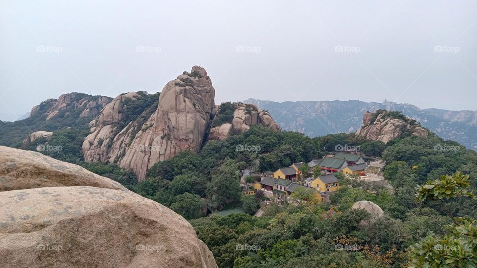 A group of temples in the large mountain.