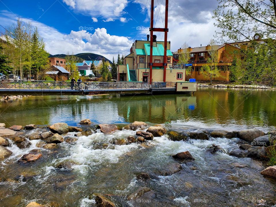 A river runs through Breckenridge Colorado and small rapids form