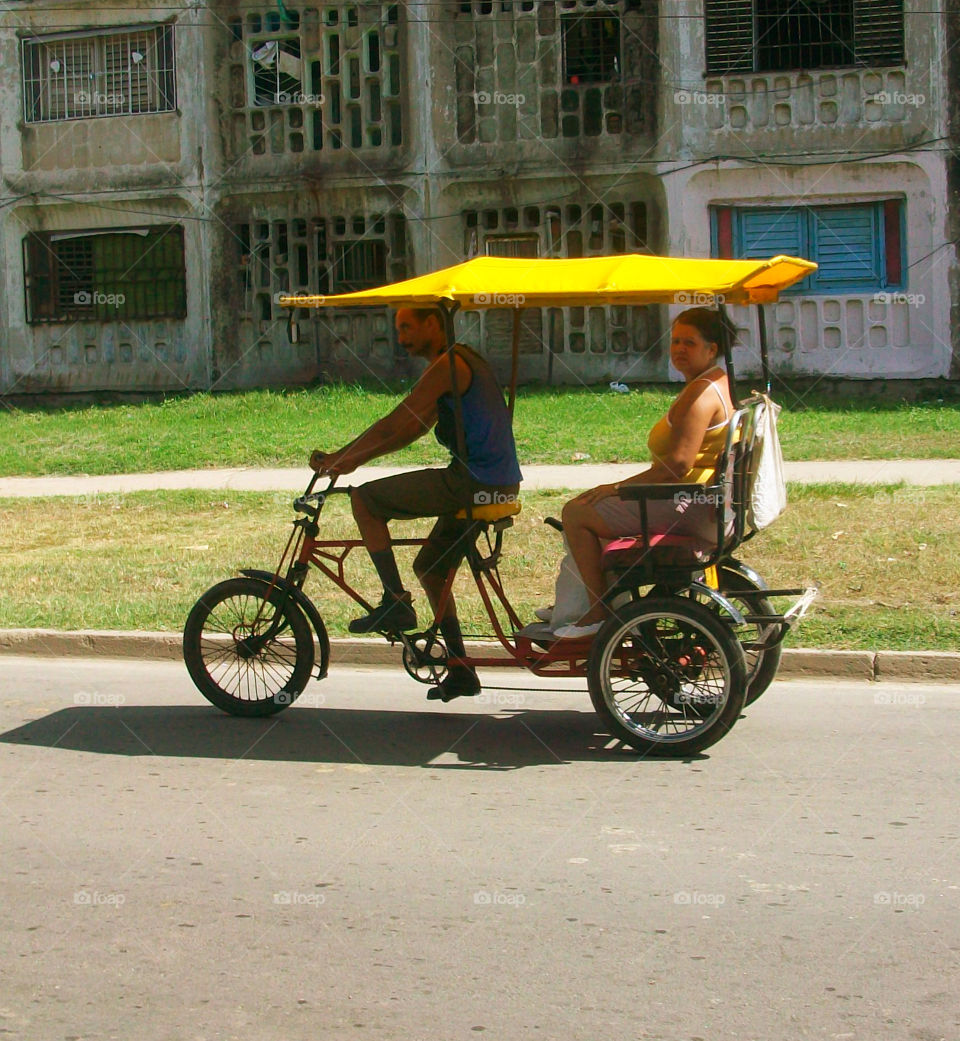 Woman travelling on rickshaw