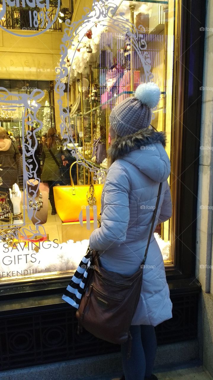 Looking into a Window of a Shop