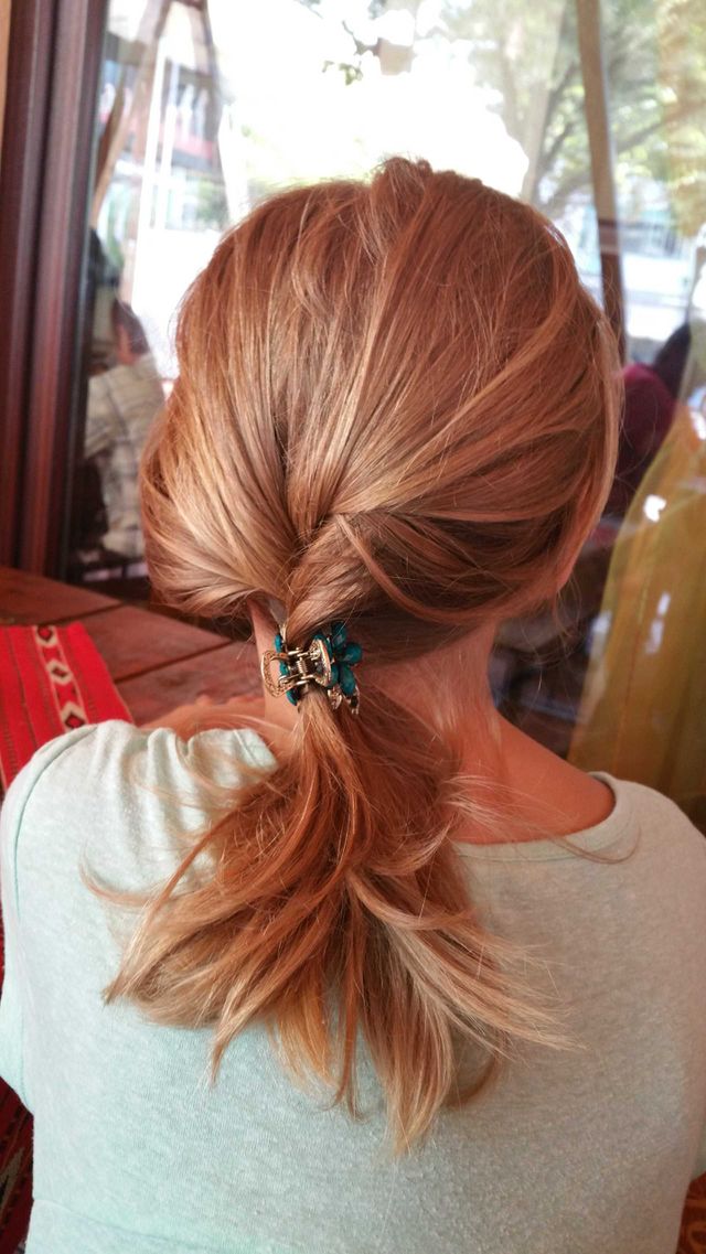 Teenage blonde hair. It looks reddish because of the colours around.