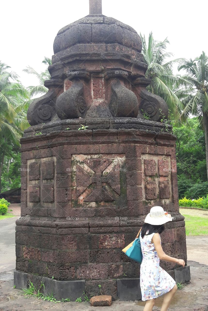 girls vacation is going on around the old architectural marvels well maintained famous hundred's of tourists daily n a must see place