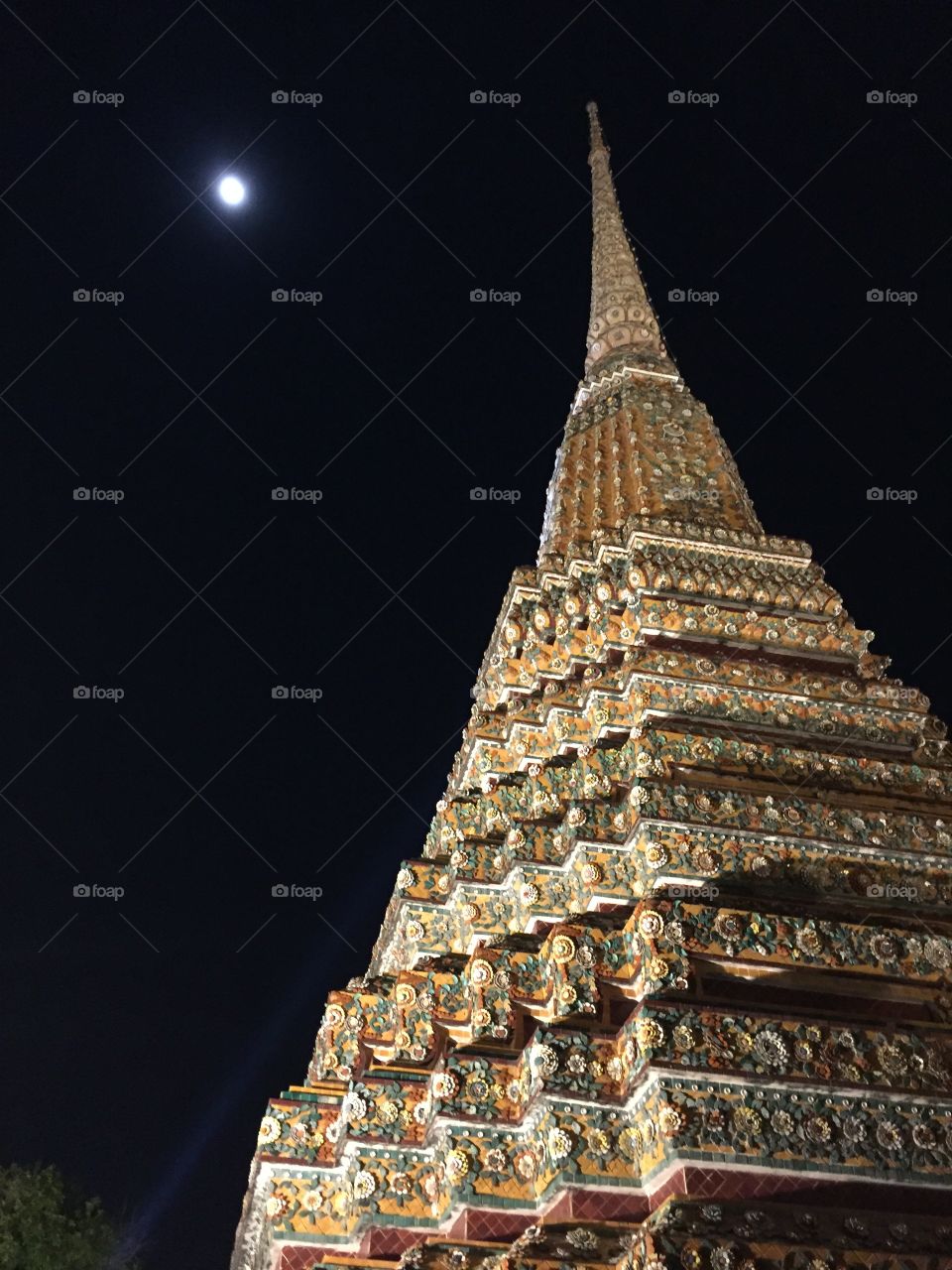 Wat Pho Temple at night under full moon