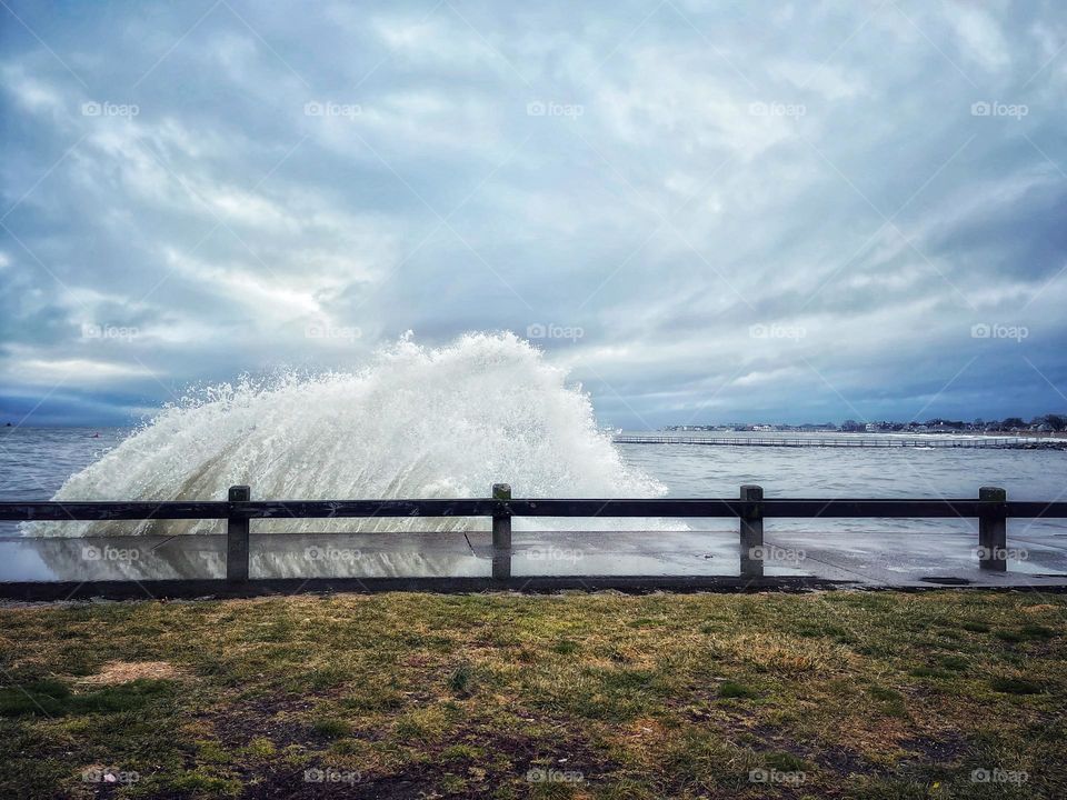 Crashing waves against the seawall 