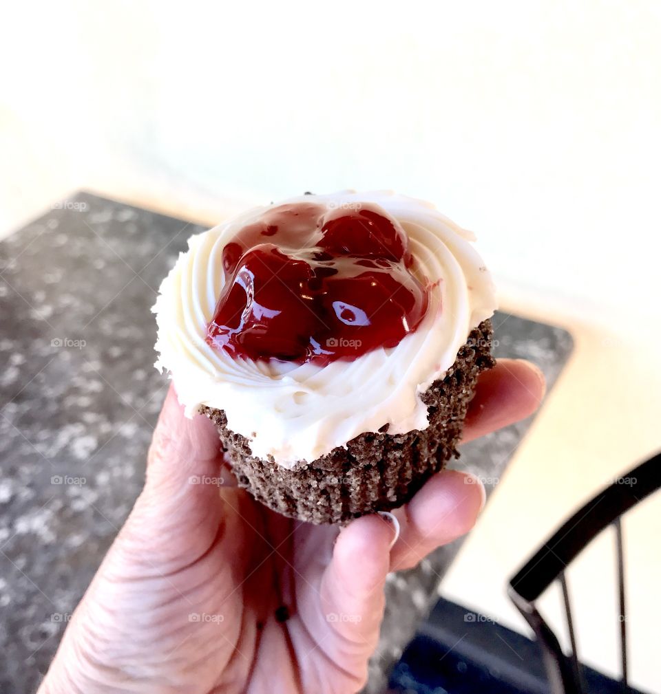 Iced Cupcake with Cherries