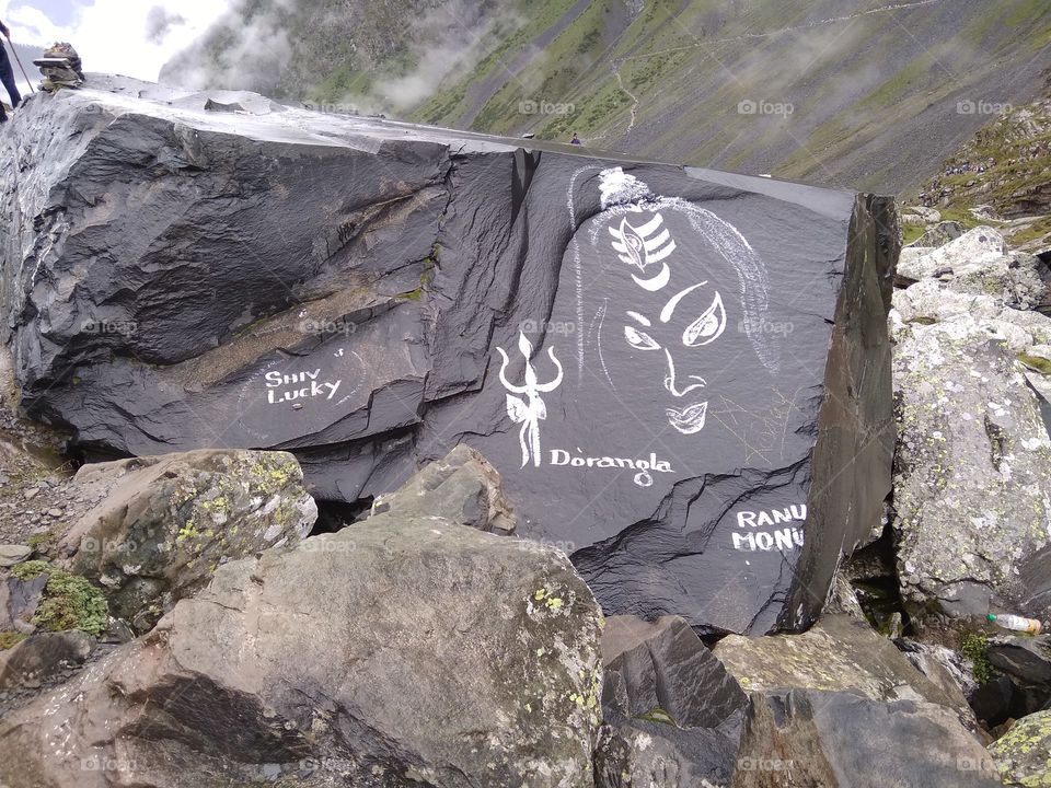 stone & image of Shiva