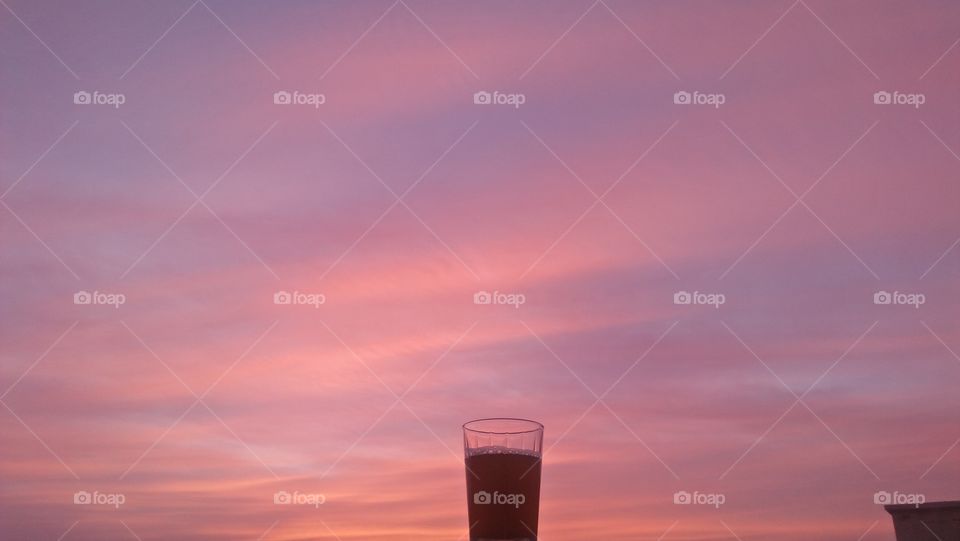 cup of tea embracing splendid sunrise.