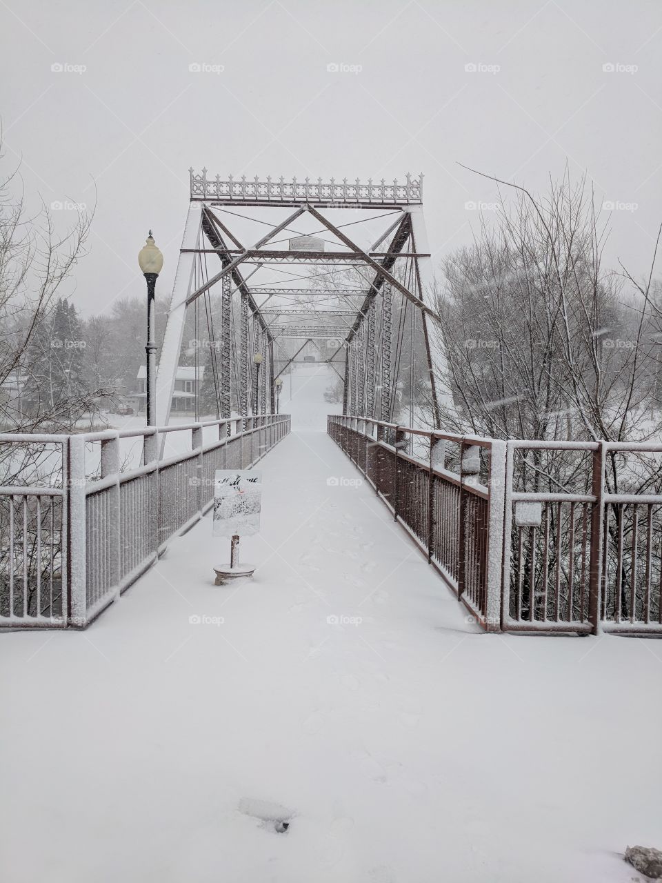 walking bridge on a snowy day