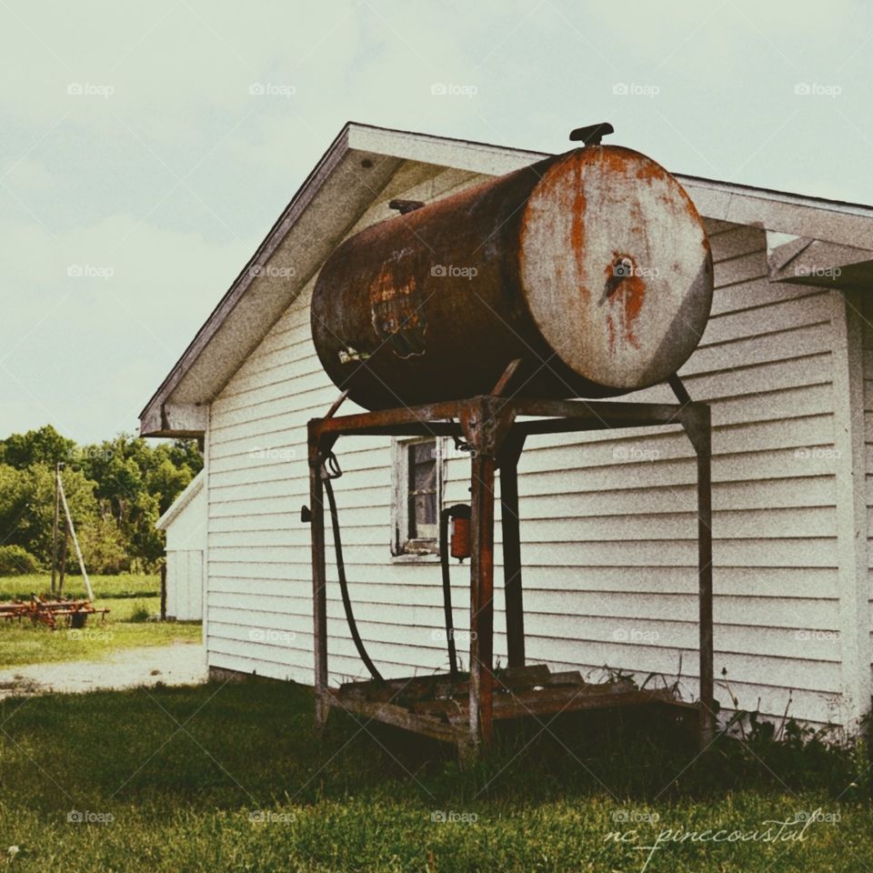 An old fuel tank where Grandpa would top off the car before church each Sunday.