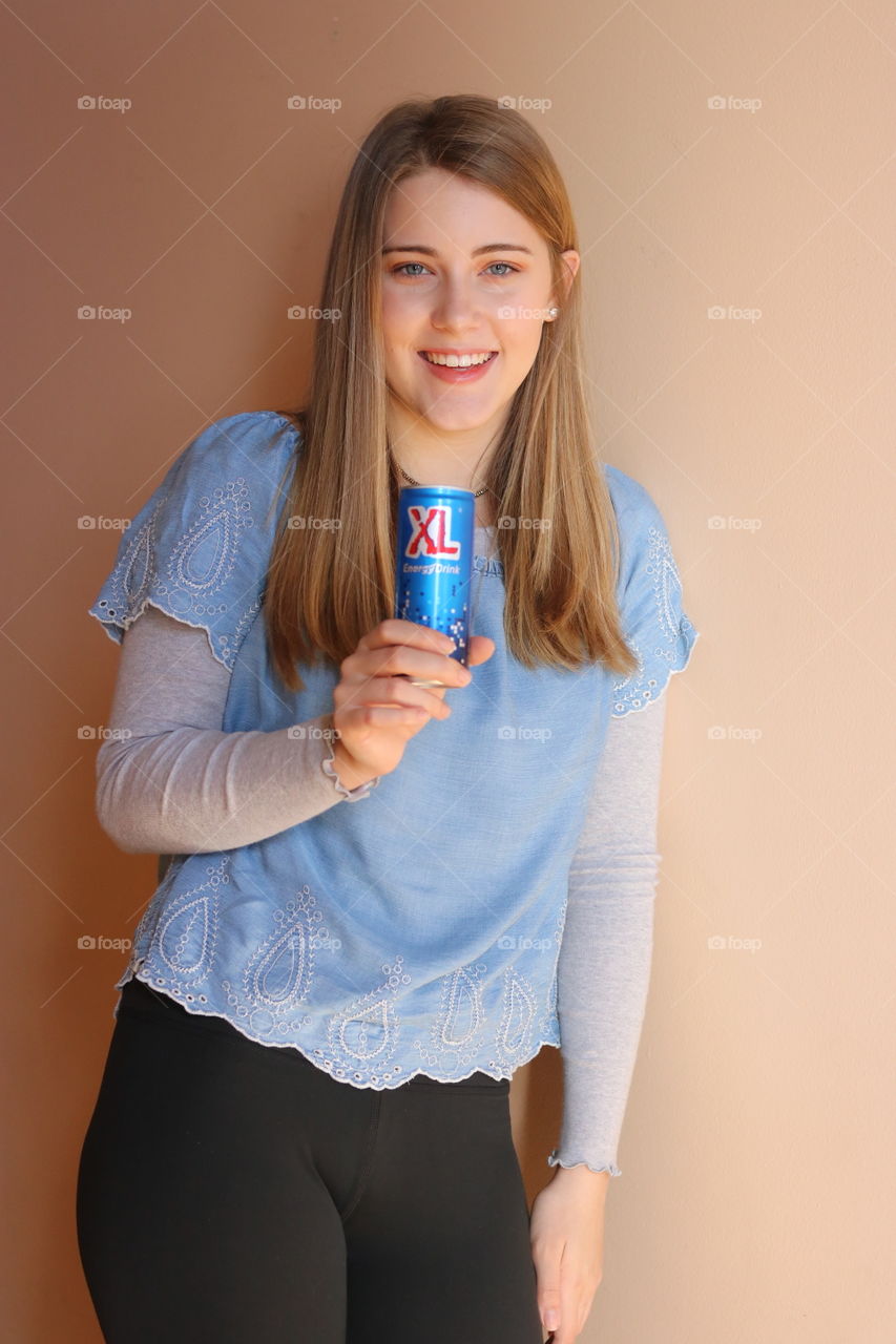 17 year old daughter holding XL Energy Drink 