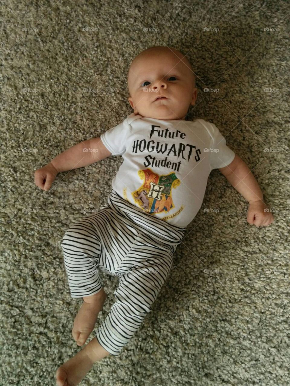 Baby Oliver ready for hogwarts 