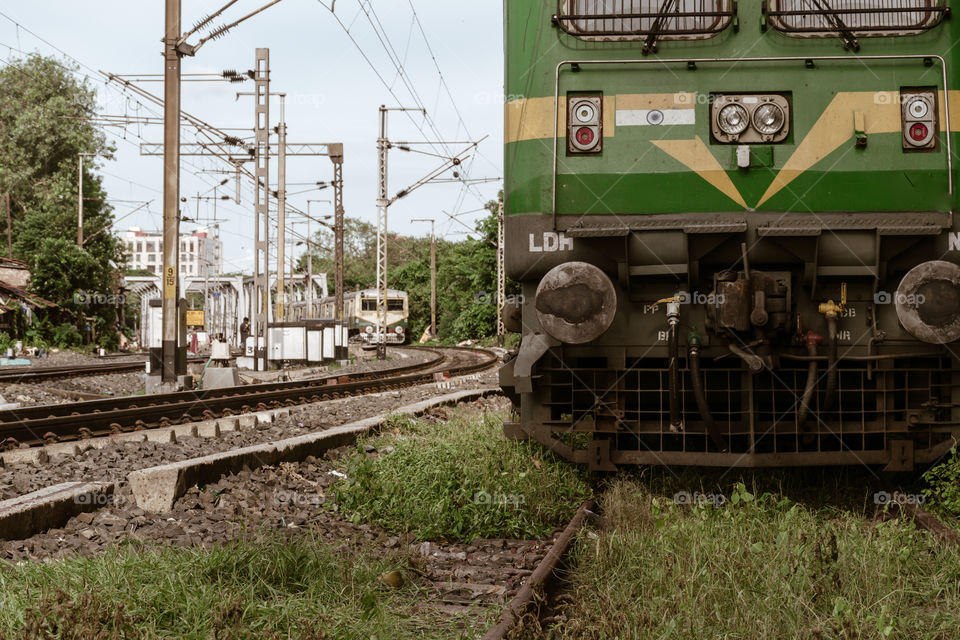 Howrah, Kolkata, August 20, 2019 – A high power electric WAG-9 locomotive loco engine wagon on rail tracks of Indian Railway. WAG-9 locomotives is most powerful freight locomotive in Indian Railways.