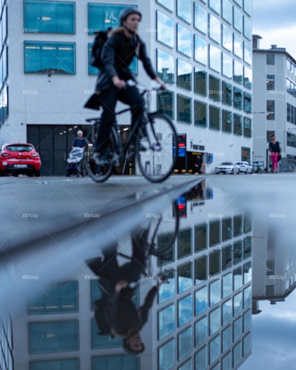 Street Photography with a Pond with reflection