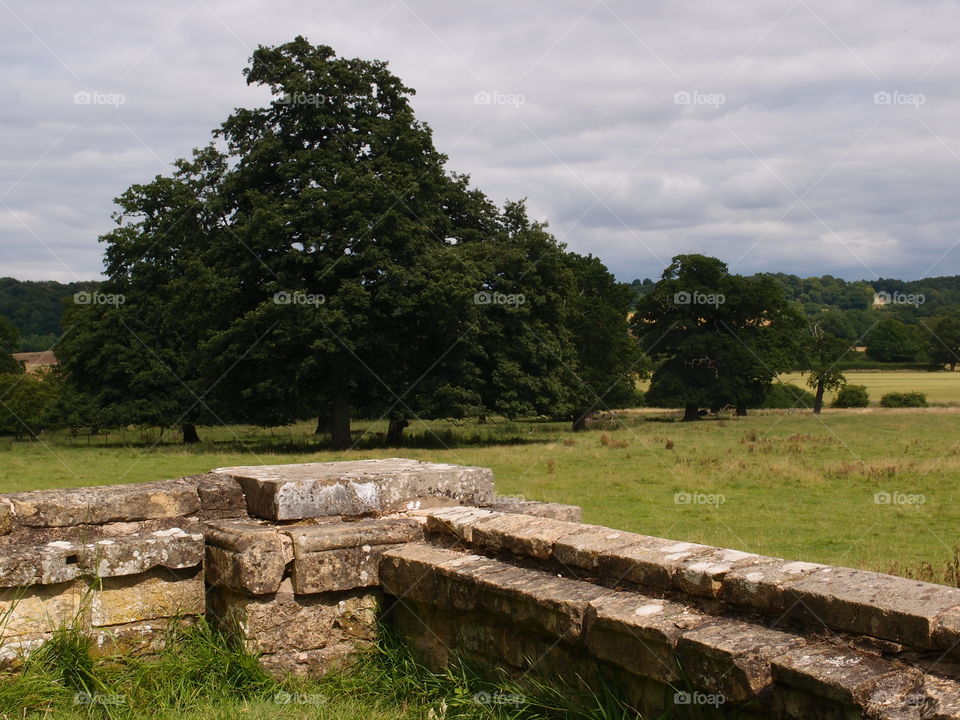The remains of an old castle on the grounds of Castle Howard in the English countryside. 