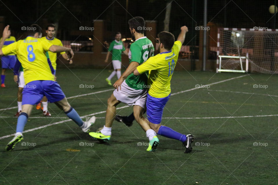 Soccer players fighting 