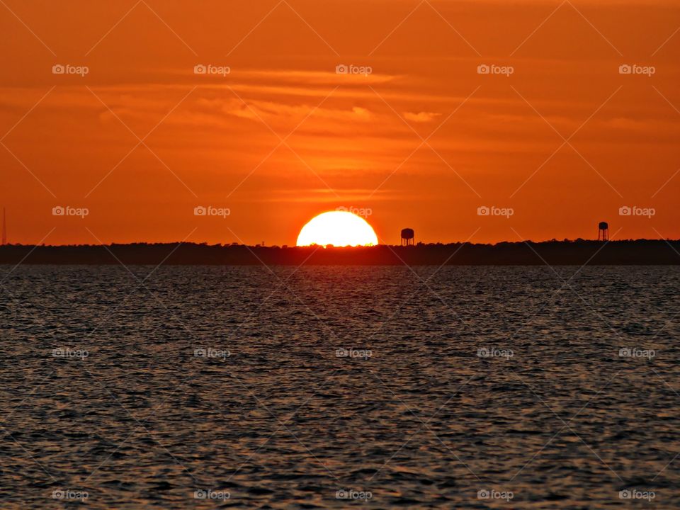 
The big orange ball slowly going down and down and it sets into the horizon making the sky absolutely stunning. 