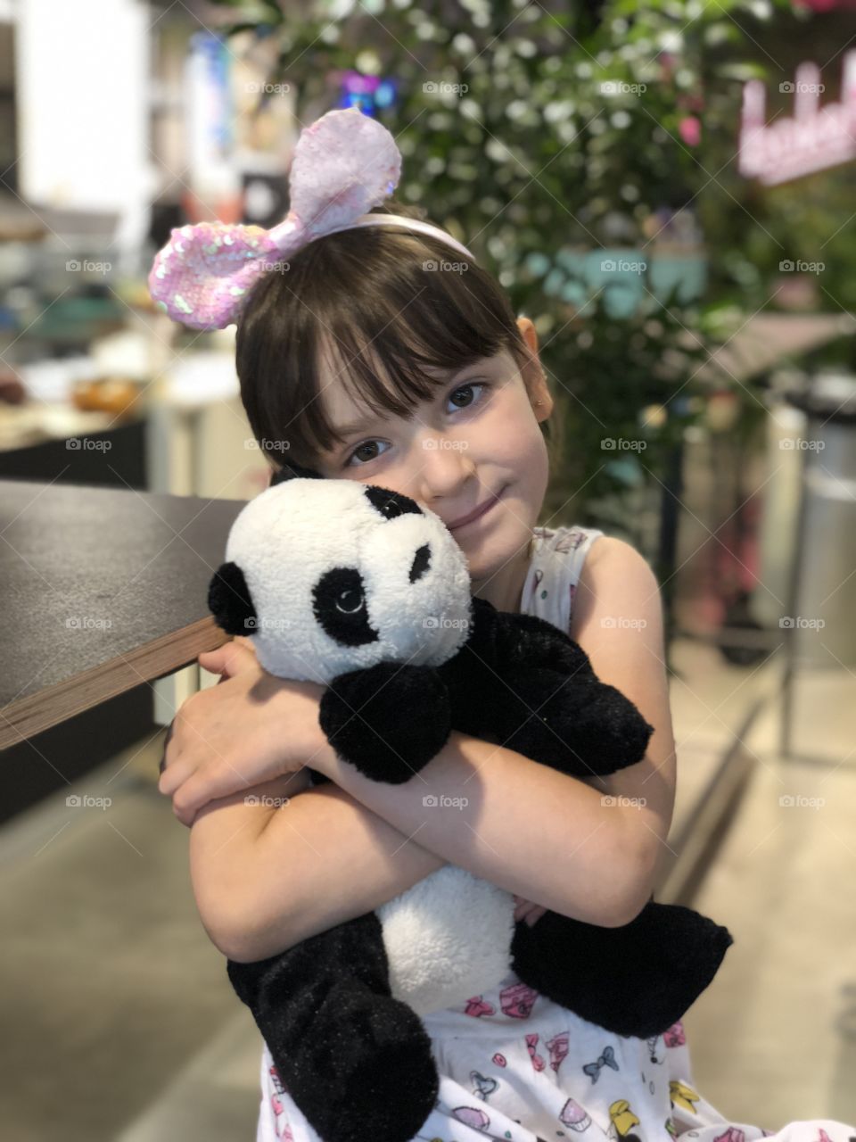 Little girl and panda 