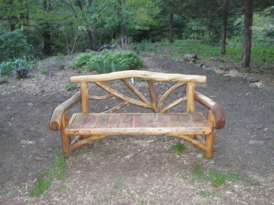 garden bench made from branches