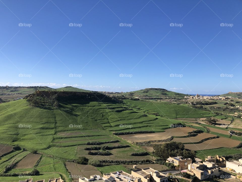 A beautiful, verdant and sunny shot of the countryside in Gozo, Malta. 