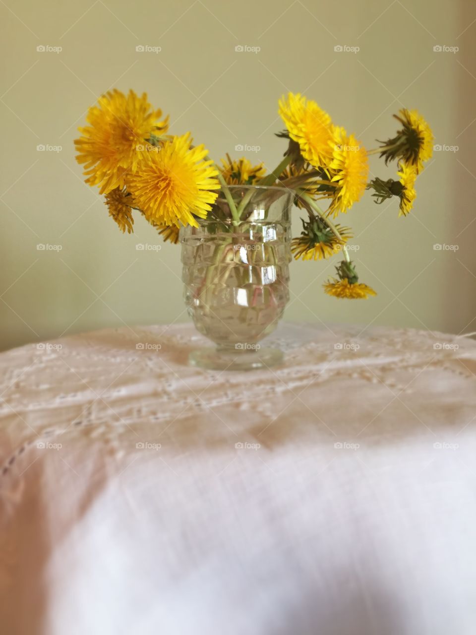 Dandelion Vase. A bouquet of dandelion flowers in a vase. 