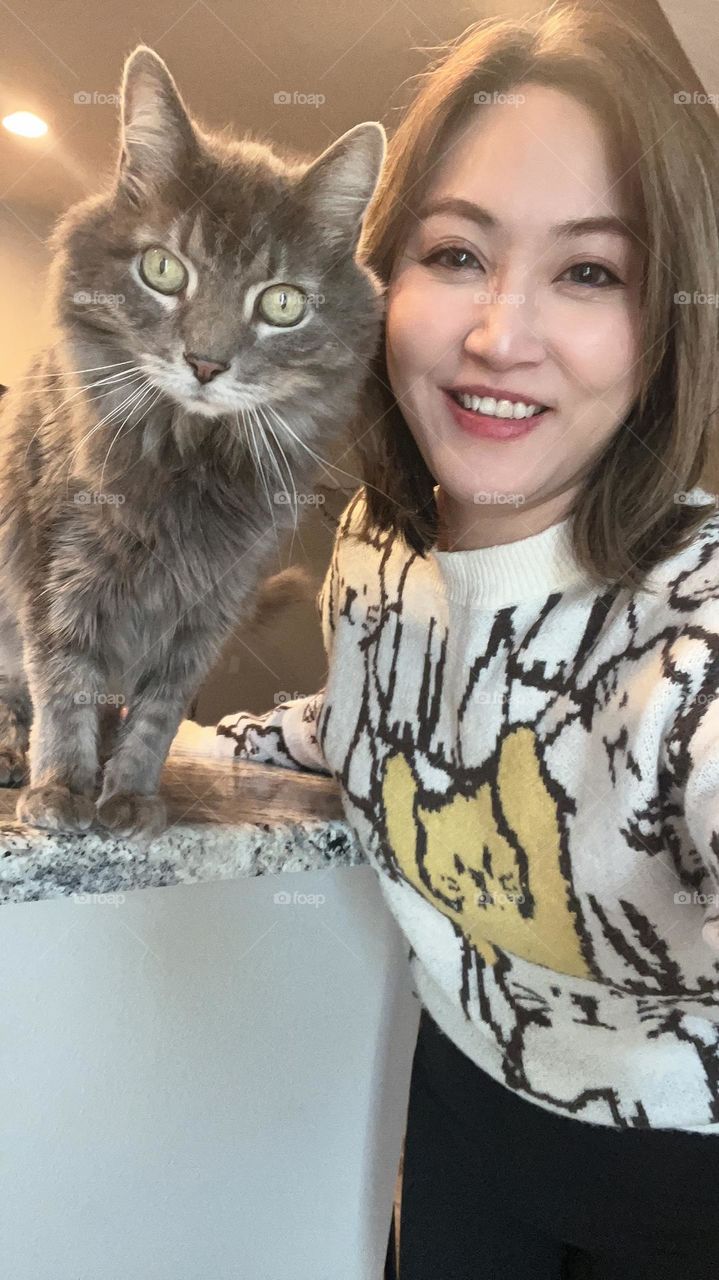 Happy with my cat! He is an adorable cat and so smart! 