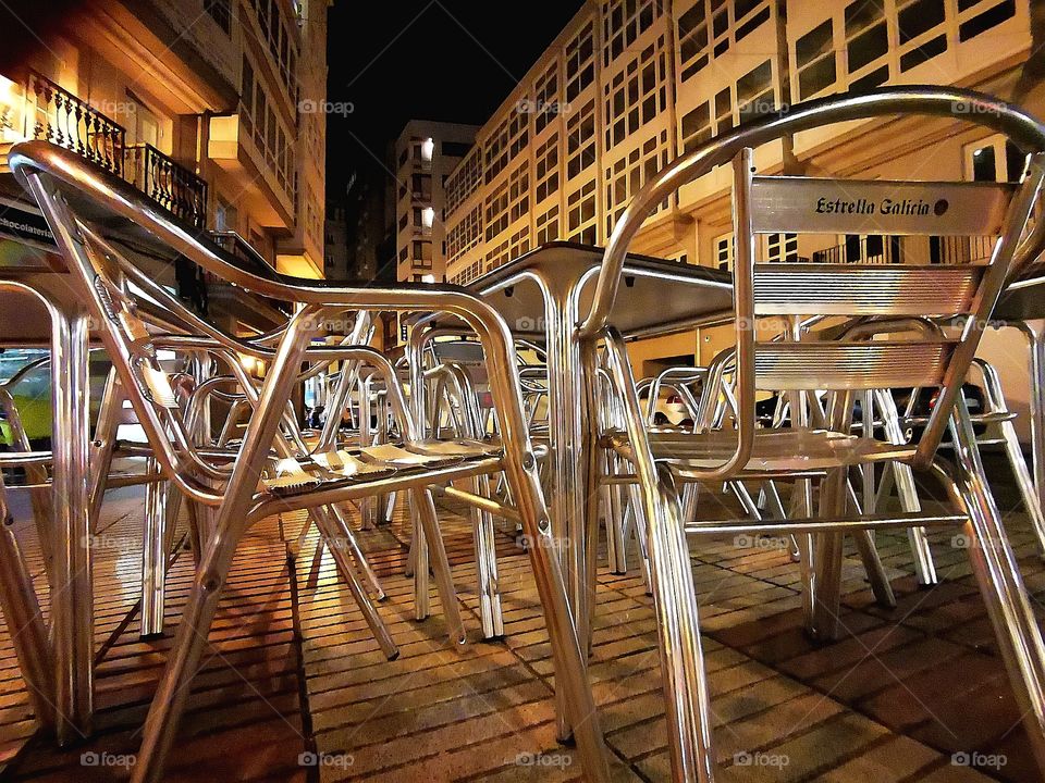 Chairs and tables in the street, terrace