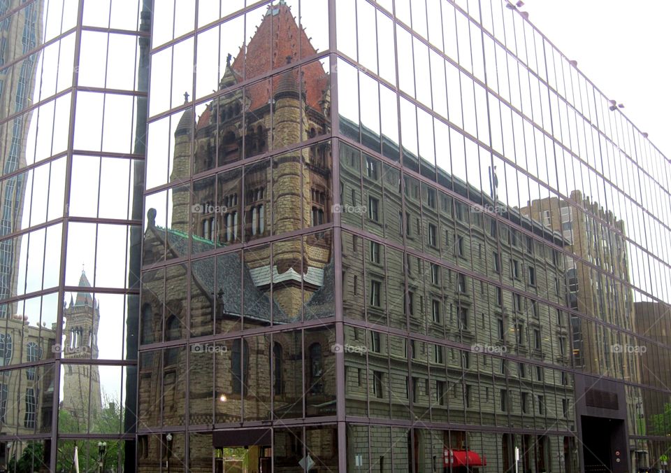 perfect cathedral reflection over glass building