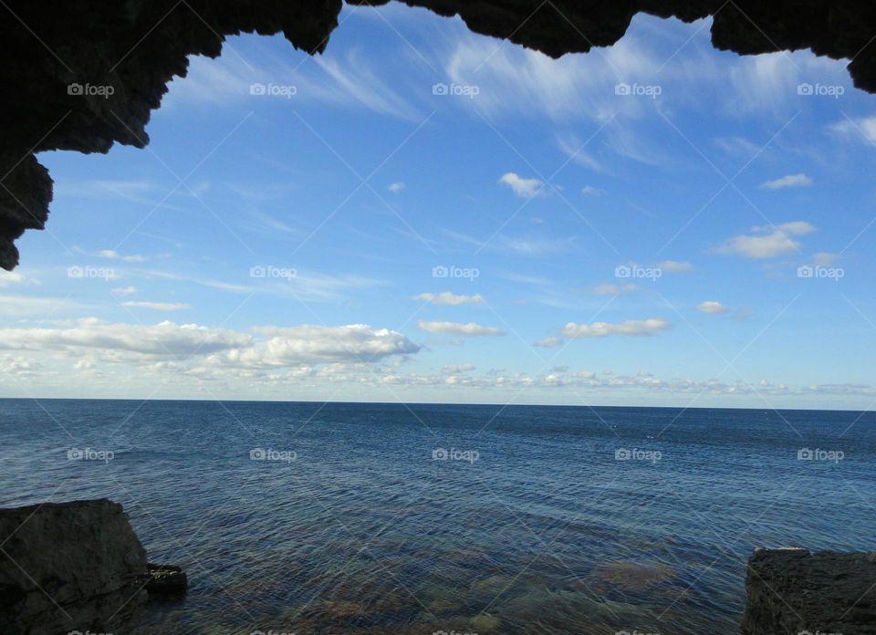 Blue seascape view from cave