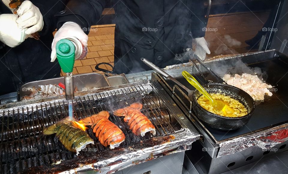 torched lobster steet food in seoul, south korea
