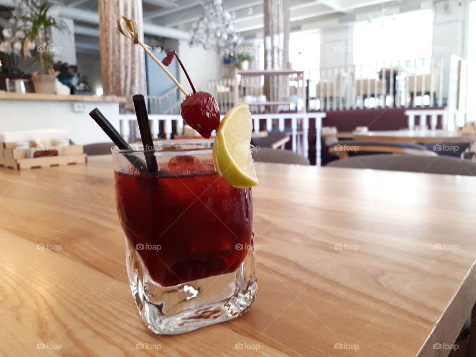 Red cocktail on the table