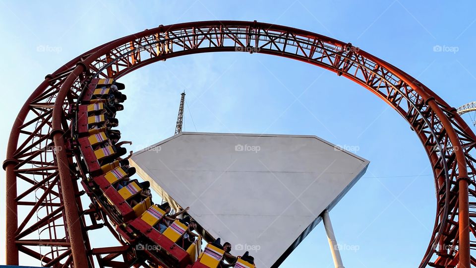 People having fun on the roller coaster