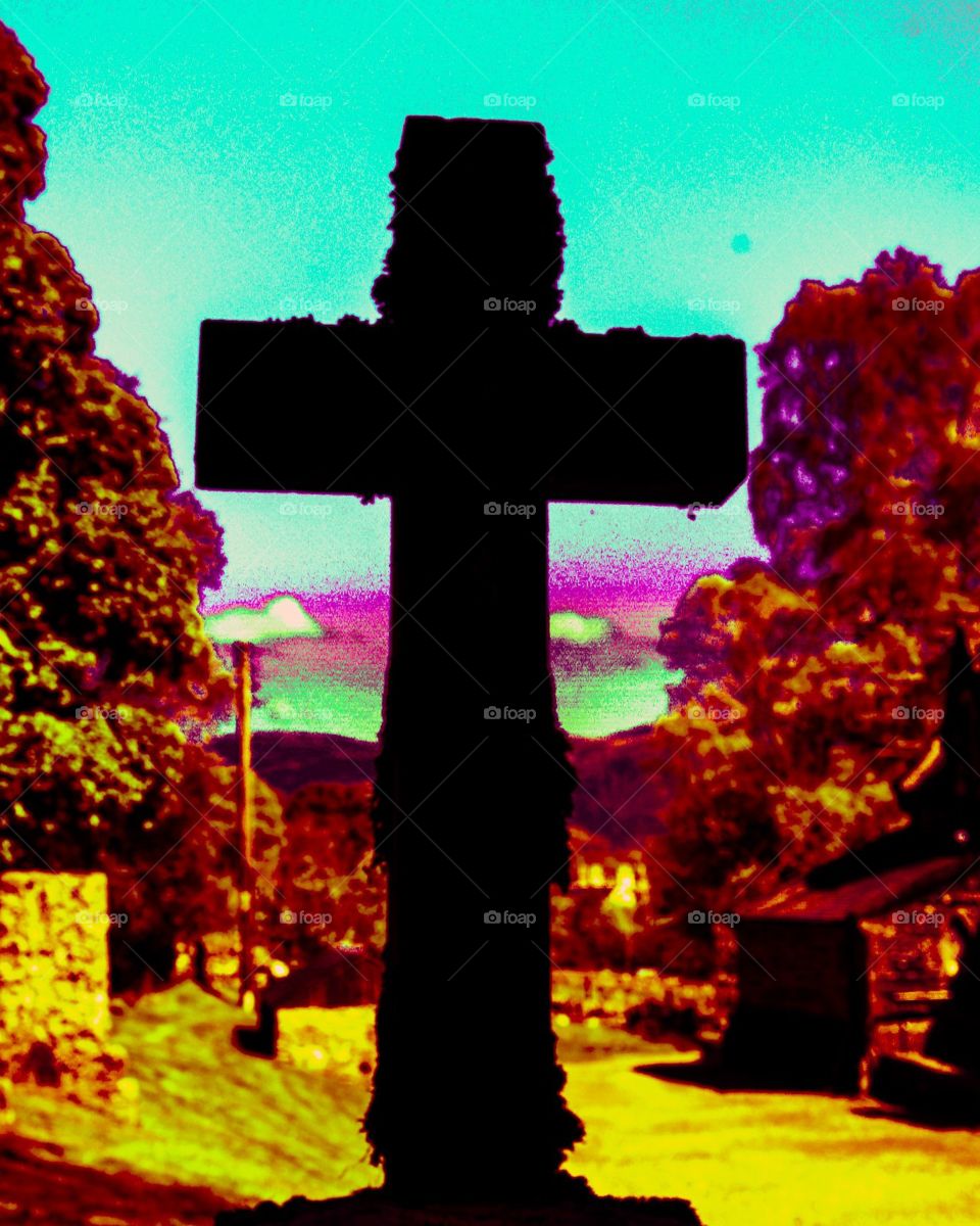 Trippy old cross headstone