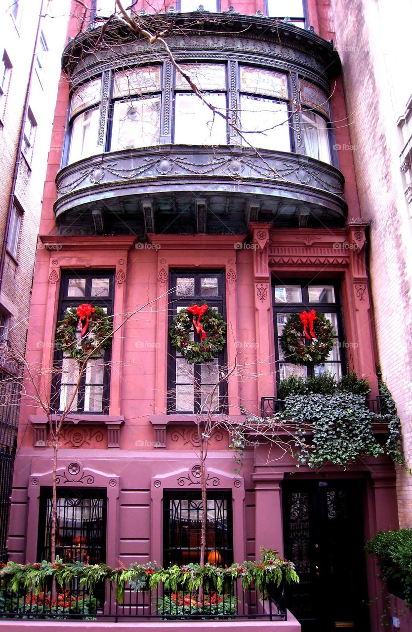 Decorative window of pink building