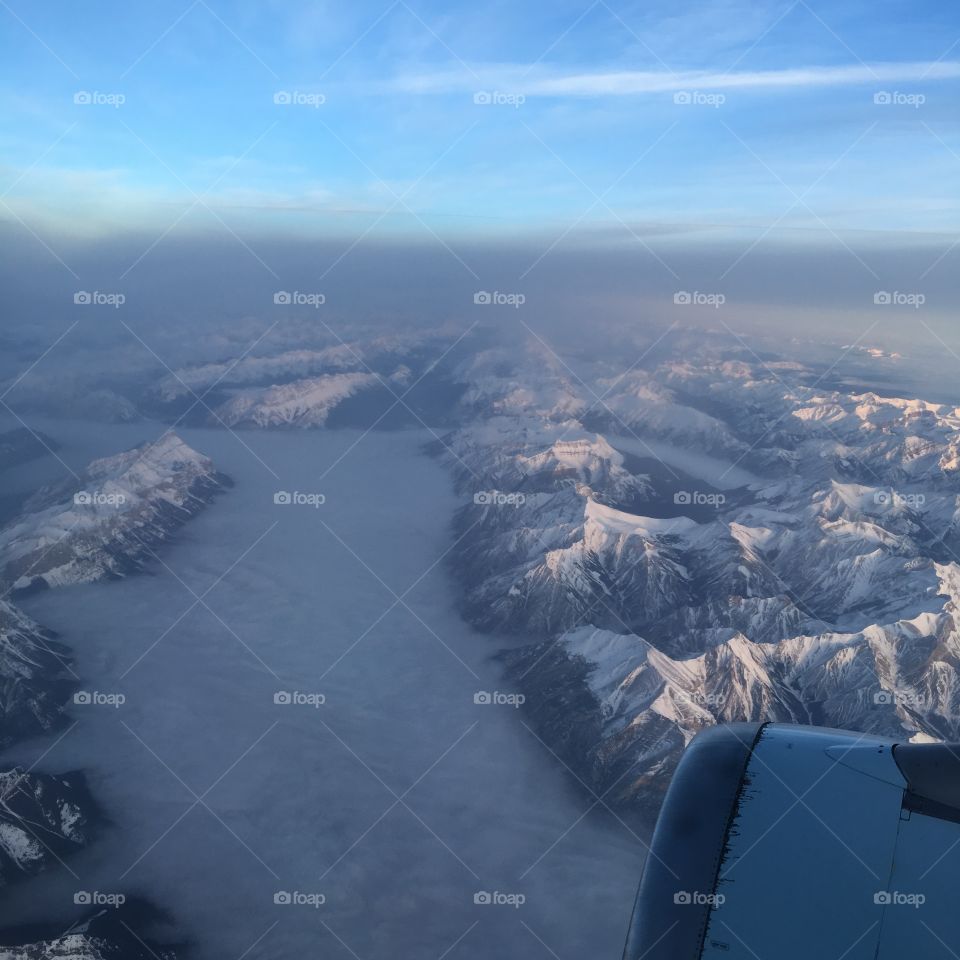 flying over rocky mountains from Calgary to Vancouver