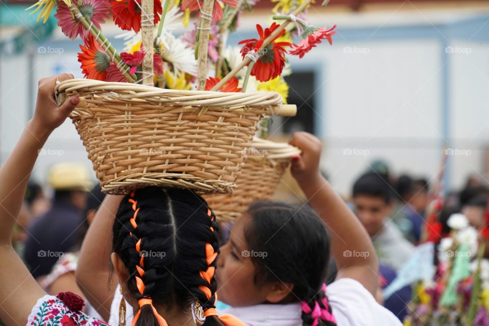 Mexican Women Carrying Flower Baskets On Their Heads