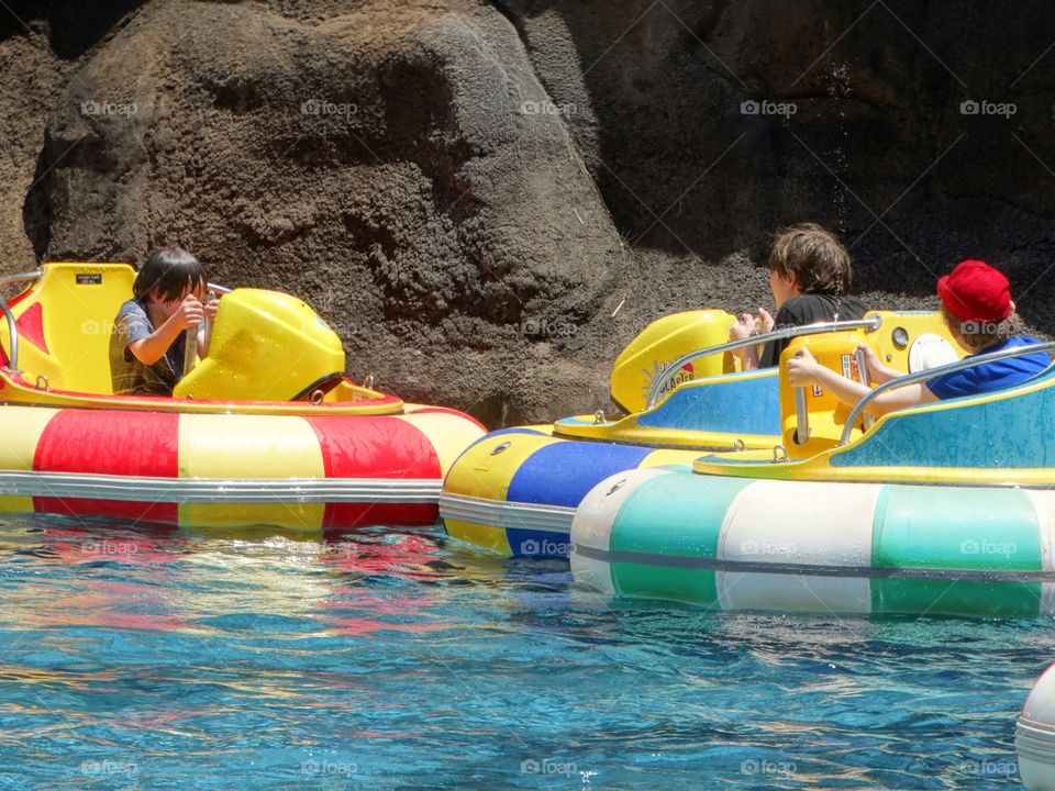 Kids Playing In Water