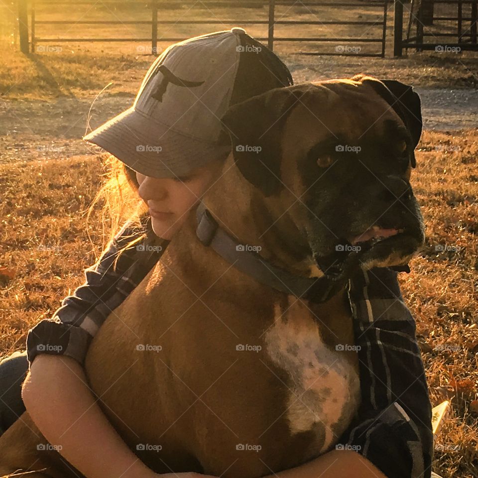 Girl and her boxer dog 
