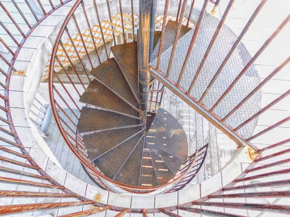 Spiral of Theodorus.... rusty metal staircase 