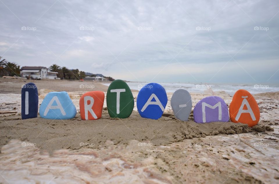 Iarta-mă, forgive me in romanian Language on stones