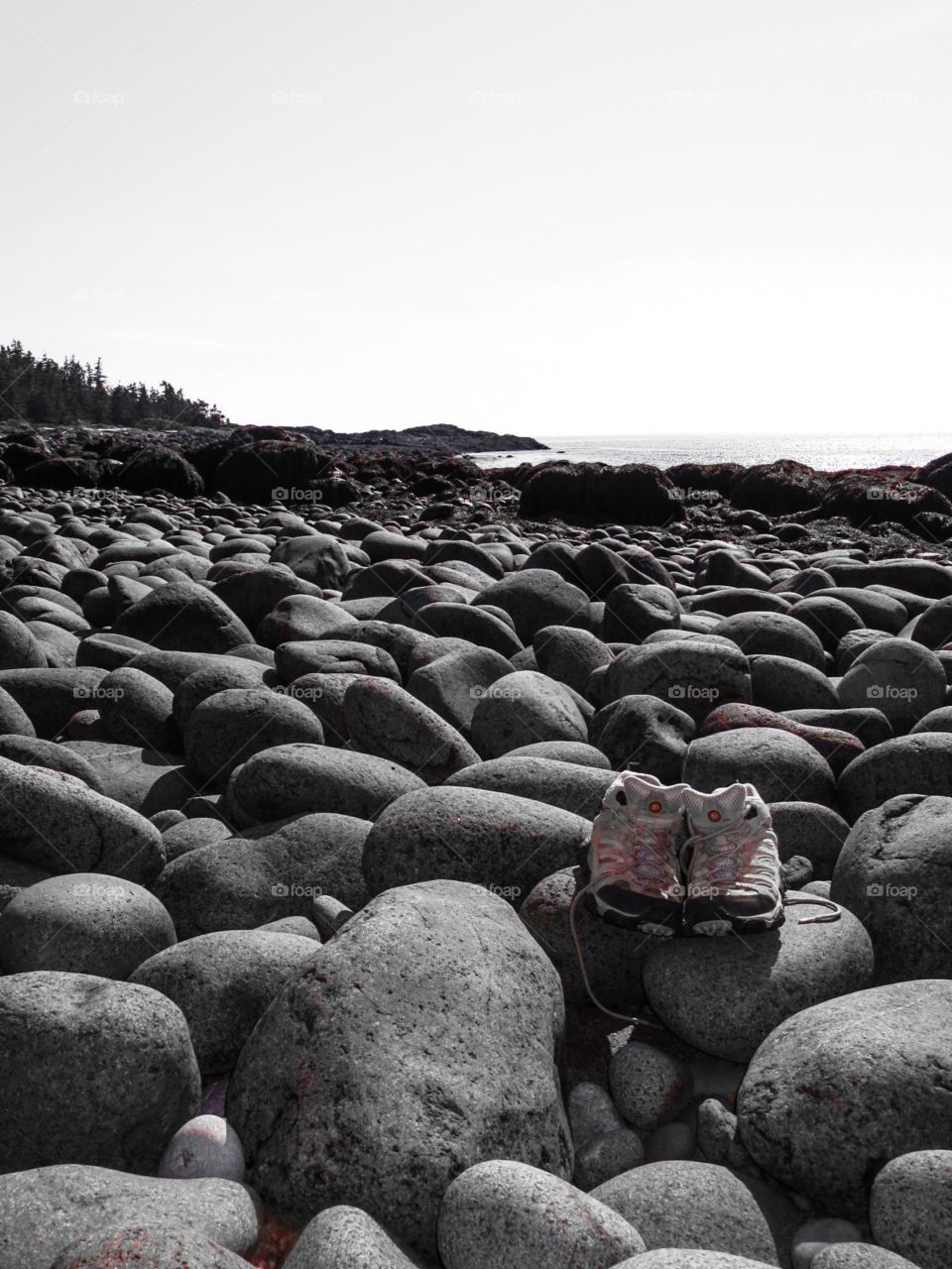 Rock Climb. Stone sea shore hike on walkabout in Nova Scotia