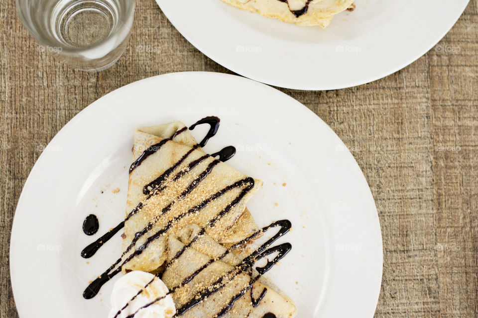 Pancakes on plate with chocolate