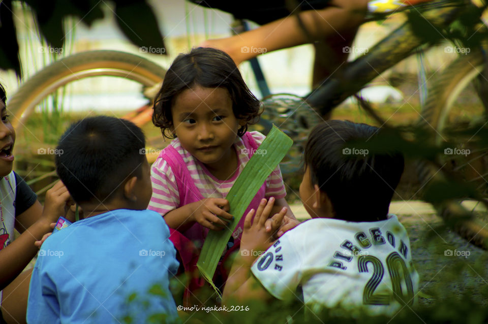Group of Asian friends sitting together